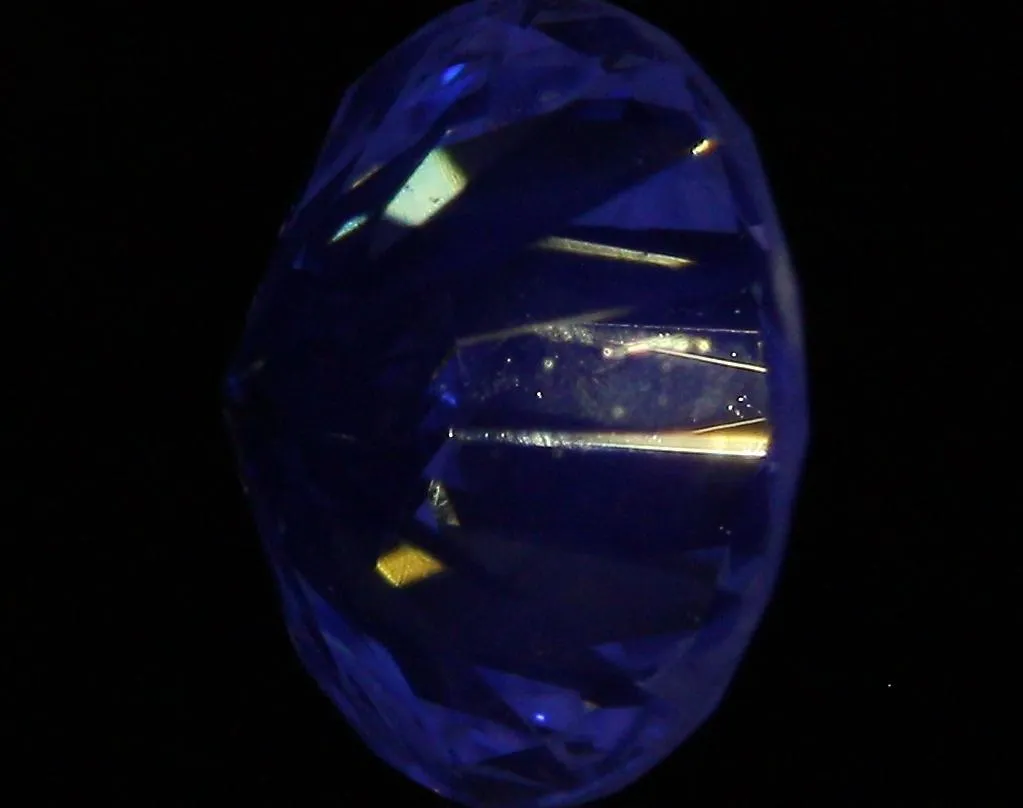 0.60 Carat H SI1 Round Diamond