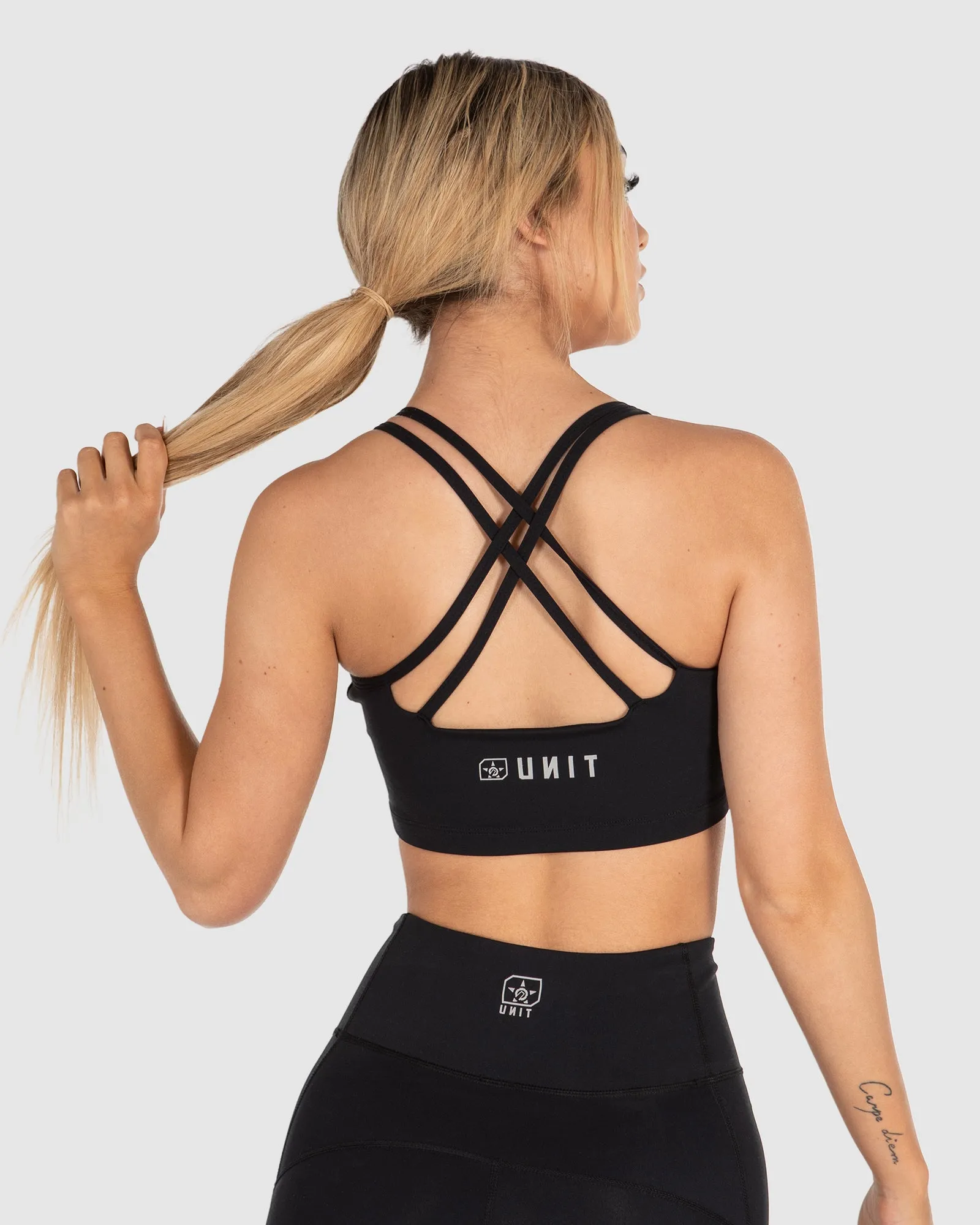 UNIT Motion Strap Sport Bra's